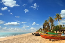 Fishing boats on a beach in South Goa Fishing boats on a beach in South Goa