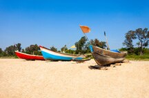 Fishing boats on the beach in Goa Fishing boats on the beach in Goa