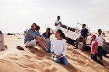 Couple enjoying Desert Safari experience Couple enjoying Desert Safari experience